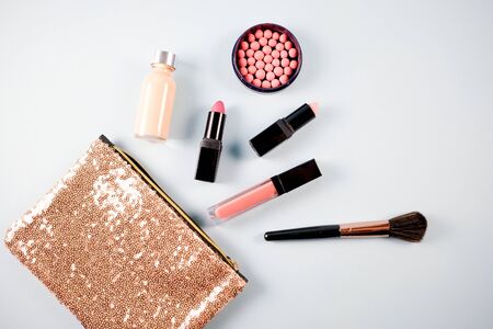 Beauty background for makeup cosmetic product on pastel light blue desktop background. top view, flat lay.の写真素材