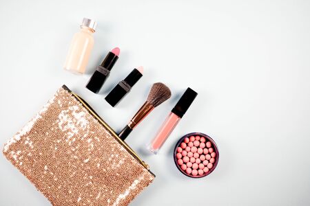 Beauty background for makeup cosmetic product on pastel light blue desktop background. top view, flat lay.の写真素材