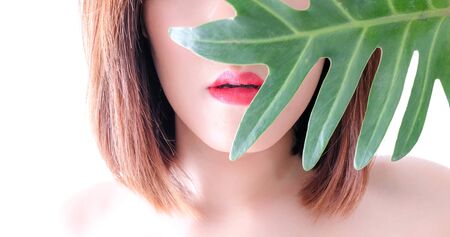 Young beautiful asian woman applying make up. cosmetic beauty conceptの写真素材