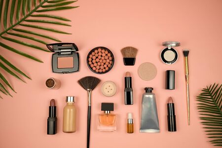 Makeup cosmetic flay lay pink cloral backgroundの写真素材