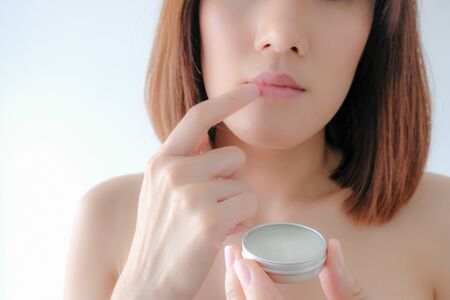 Young asian beauty blogger influencer show make up tutorial .cosmetic skincare concept for social media.の写真素材
