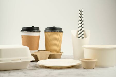 Eco-friendly biodegradable coffee cup , box, blow, plate,straw made by paper and recycle packaging.の写真素材