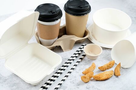 Eco-friendly biodegradable coffee cup , box, blow, plate,straw made by paper and recycle packaging.の写真素材