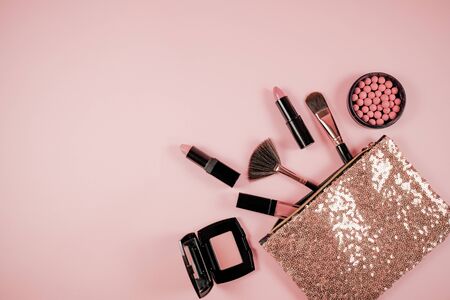 Makeup cosmetic flay lay pink cloral backgroundの写真素材