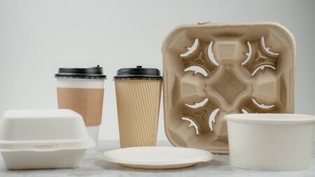 Eco-friendly biodegradable coffee cup , box, blow, plate,straw made by paper and recycle packaging.の写真素材
