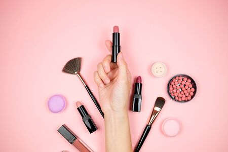 Makeup cosmetic flay lay pink cloral backgroundの写真素材