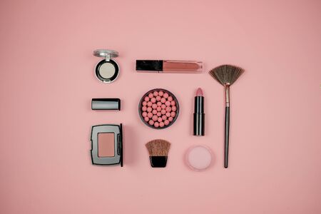 Makeup cosmetic flay lay pink cloral backgroundの写真素材