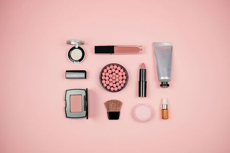 Makeup cosmetic flay lay pink floral backgroundの写真素材