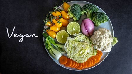 vegan and vegetarian diet healthy food. vegetable decorative on black background