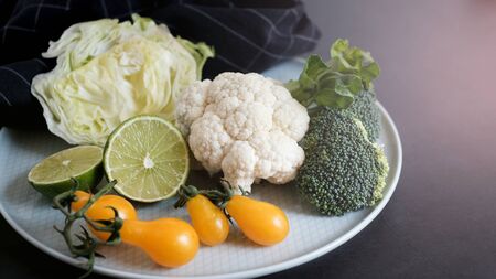 vegan and vegetarian diet healthy food. vegetable decorative on black backgroundの写真素材