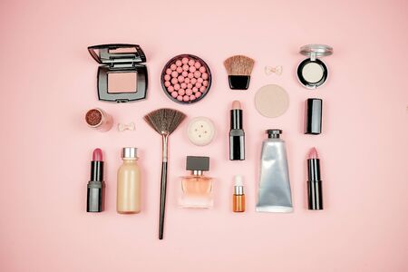 decorative make up flatlay on pink backgroundの写真素材