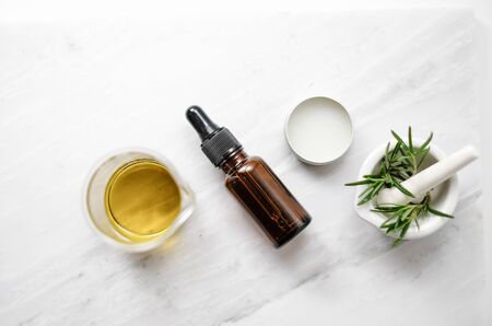 beauty spa skin care product with rosemary and natural essential oil. beauty spa skin care product with rosemary and natural essential oil.の写真素材