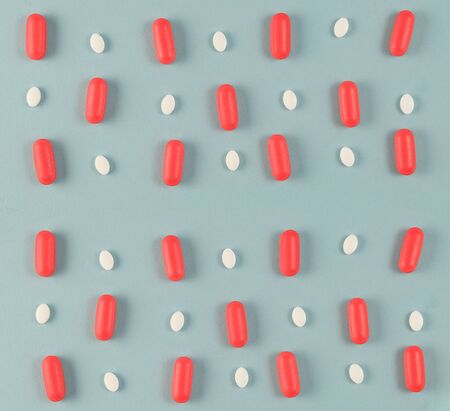medicine pattern on bright blue background. modern pharmacyの写真素材