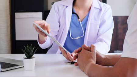 doctor explain to patient in the medical clinic or hospital. healthcare and wellness living.の写真素材