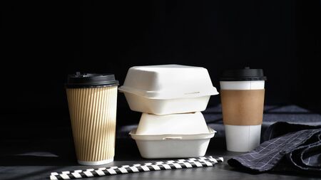biodegradable cardboard paper coffee cup and food package. eco friendly drink packaging.の写真素材