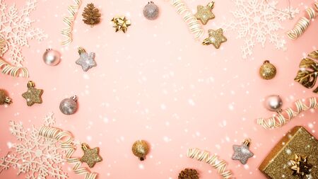 2020 Christmas and new year background banner with the beautiful decor gift for holiday in winter. On bright pink, golden and silver color theme with snow flake. top view with copy space.の写真素材