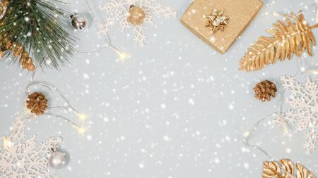2020 Christmas and new year background banner with the beautiful decor gift for holiday in winter. On bright blue, golden and silver color theme with snow flake. top view with copy space.の写真素材