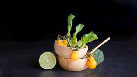 vegan and vegetarian diet healthy food. vegetable decorative on black backgroundの写真素材