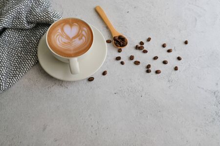 Coffee cup and beans top view with copyspace . flat lay latte for menu, background, banner and advertisement. brew caffeine drink and modern style.の写真素材