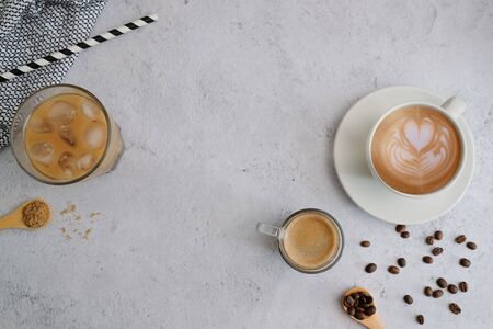 Coffee cup and beans top view with copyspace . flat lay latte for menu, background, banner and advertisement. brew caffeine drink and modern style.の写真素材
