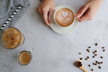 Coffee cup and beans top view with copyspace . flat lay latte for menu, background, banner and advertisement. brew caffeine drink and modern style.の写真素材