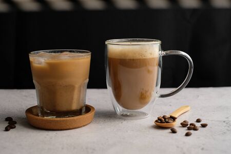 Coffee cup and beans top view with copyspace . flat lay latte for menu, background, banner and advertisement. brew caffeine drink and modern style.の写真素材