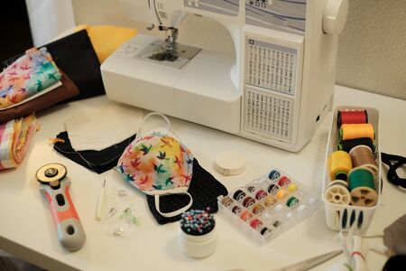 sewing home made mask to prevent corona virus , covid 19.の写真素材