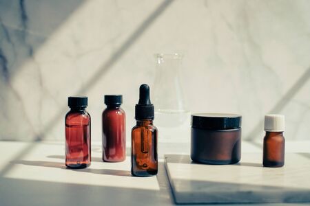 set of amber glass cosmetic skincare packaging . blank and no label.の写真素材