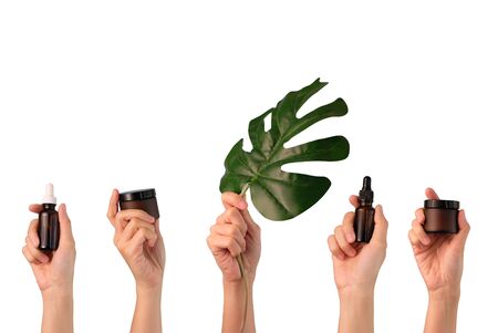 hand hold natural cosmetic skincare on white background.beauty banner.の写真素材