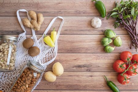 flat lay vegetable healthy cooking recipe on wood background.の写真素材