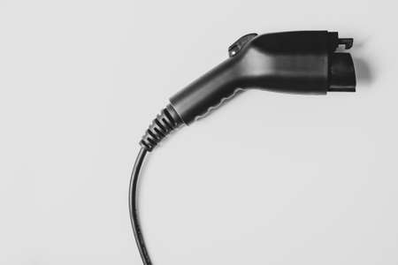 black car charger isolated . ev electric vehicle for environment.の写真素材