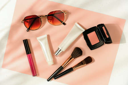Beauty cosmetic product on flatlay background . Skincare for summer and travel.の写真素材