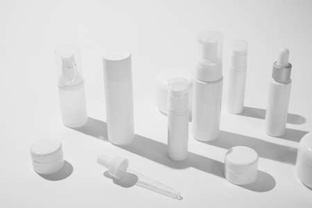 cosmetic and skin care package on white background with shadow. modern and minimal beauty product...