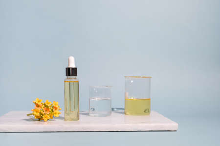 aromatherapy oil on blue background.の写真素材