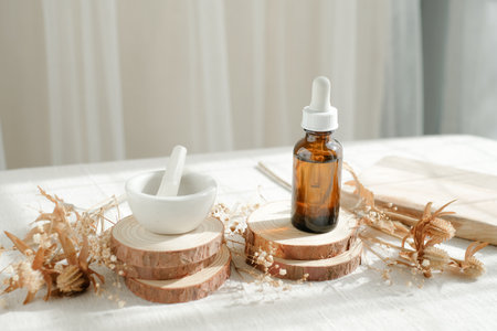 beauty product with pestle and mortar for spa and cosmetic concepts. decorate wit wooden and flowers.の写真素材