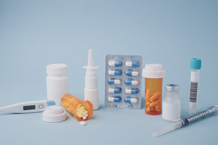 The set of medication and self-care include peel, peel, peel, nasal spray,  insulin injection on blue background.の写真素材