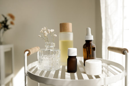 The natural skincare bottle on the white shelf in the bathroom for self-care and beauty concept. Selective focusの写真素材