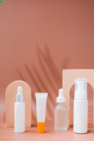 summer beauty product on a summer background. skincare and cosmetic concept with tropical leaf shadow.の写真素材