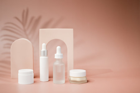 cosmetic and skincare products for summer beauty concept with tropical leaf on a pastel background.の写真素材