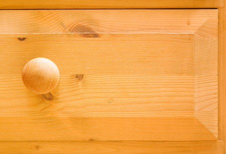 Detail of pine chest of drawersの写真素材