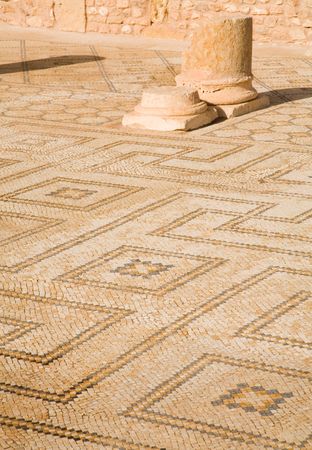 Detail of a mosaic floor and columns at roman ruinsの写真素材