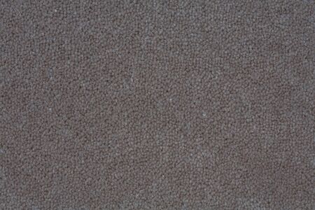 Deatil of a dark gray carpet suitable for a soft textured backgroundの写真素材