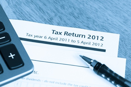 Cool toned image of UK income tax return form for 2012の写真素材