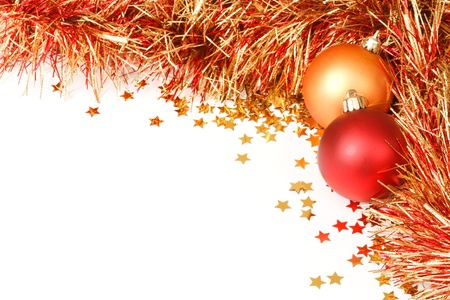 Christmas border with red and gold baubles, tinsel and confettiの写真素材