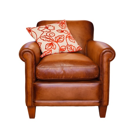 Leather armchair with trendy cushion on a white background with clipping pathの写真素材
