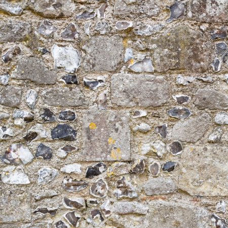 Closeup of stonework on an ancient stone wallの写真素材