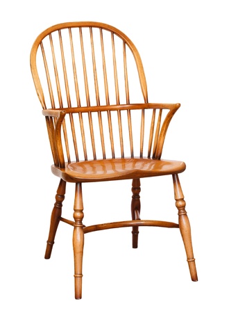 Traditional wooden arm chair isolated against a plain white backgroundの写真素材