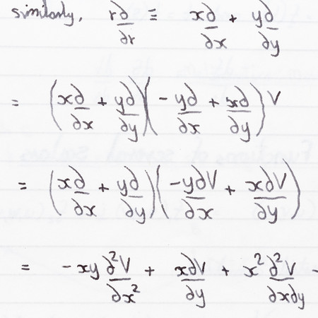 Closeup of handwritten mathematics (partial differentiation) equationsの写真素材