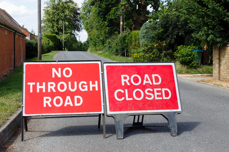 Road signs showing a street closed in the UKの写真素材
