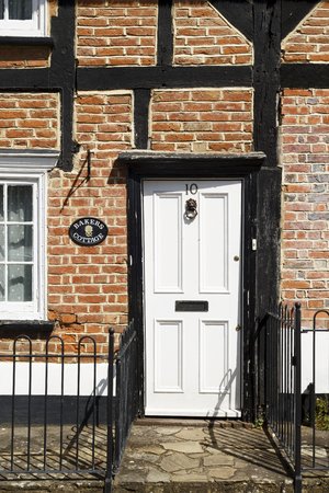 Winslow, UK - April 27, 2015. Traditional Georgian front door on a Tudor cottage in the historic market town of Winslow, Buckinghamshireのeditorial素材